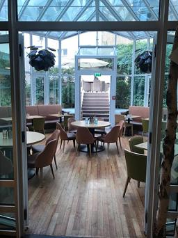 The conservatory dining area at the Scandic Hotel in Berlin